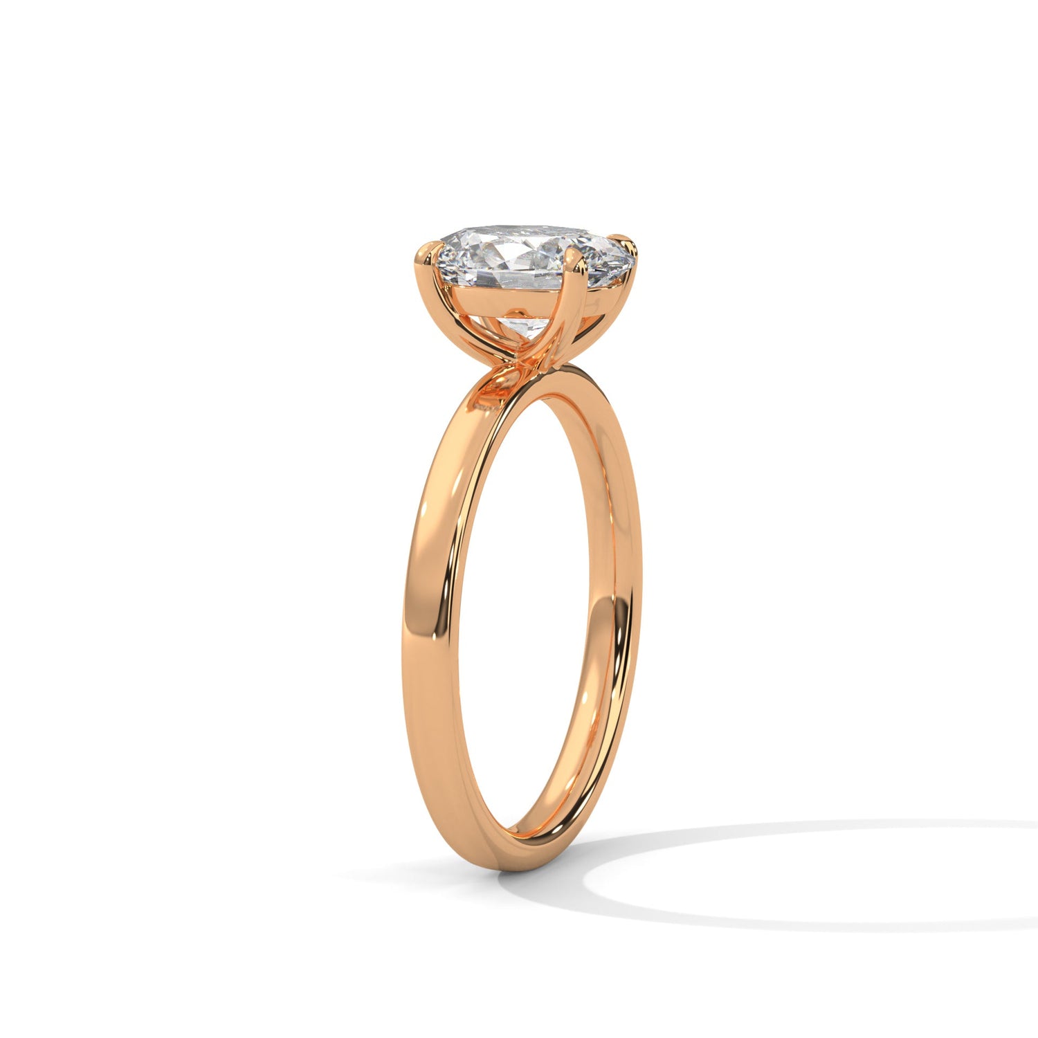 Rose gold ring with a large diamond on a white background 