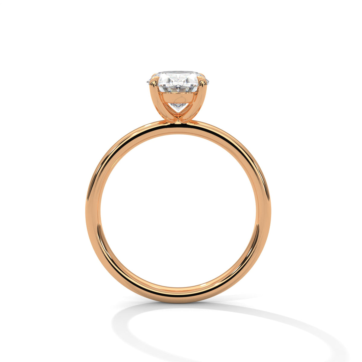 Rose gold ring with a large diamond on a white background 