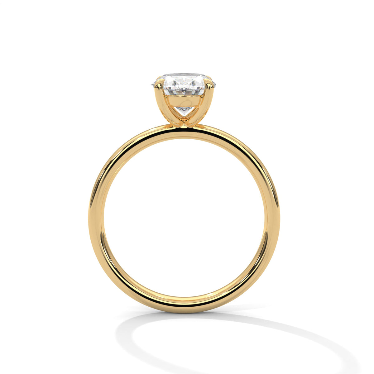 Gold ring with a large diamond on a white background 