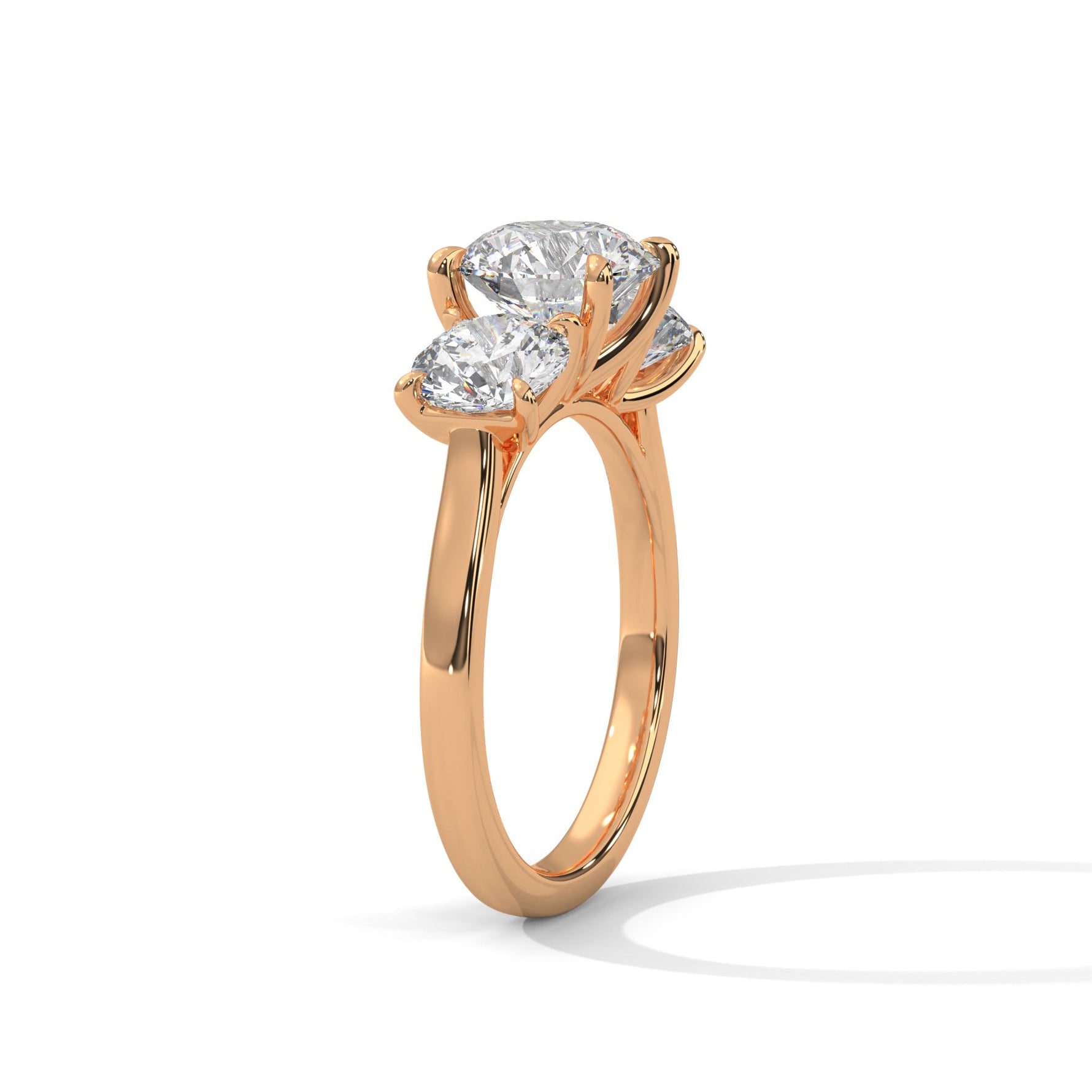 Rose gold ring with a large diamond on a white background 