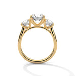 Gold ring with a large diamond on a white background 