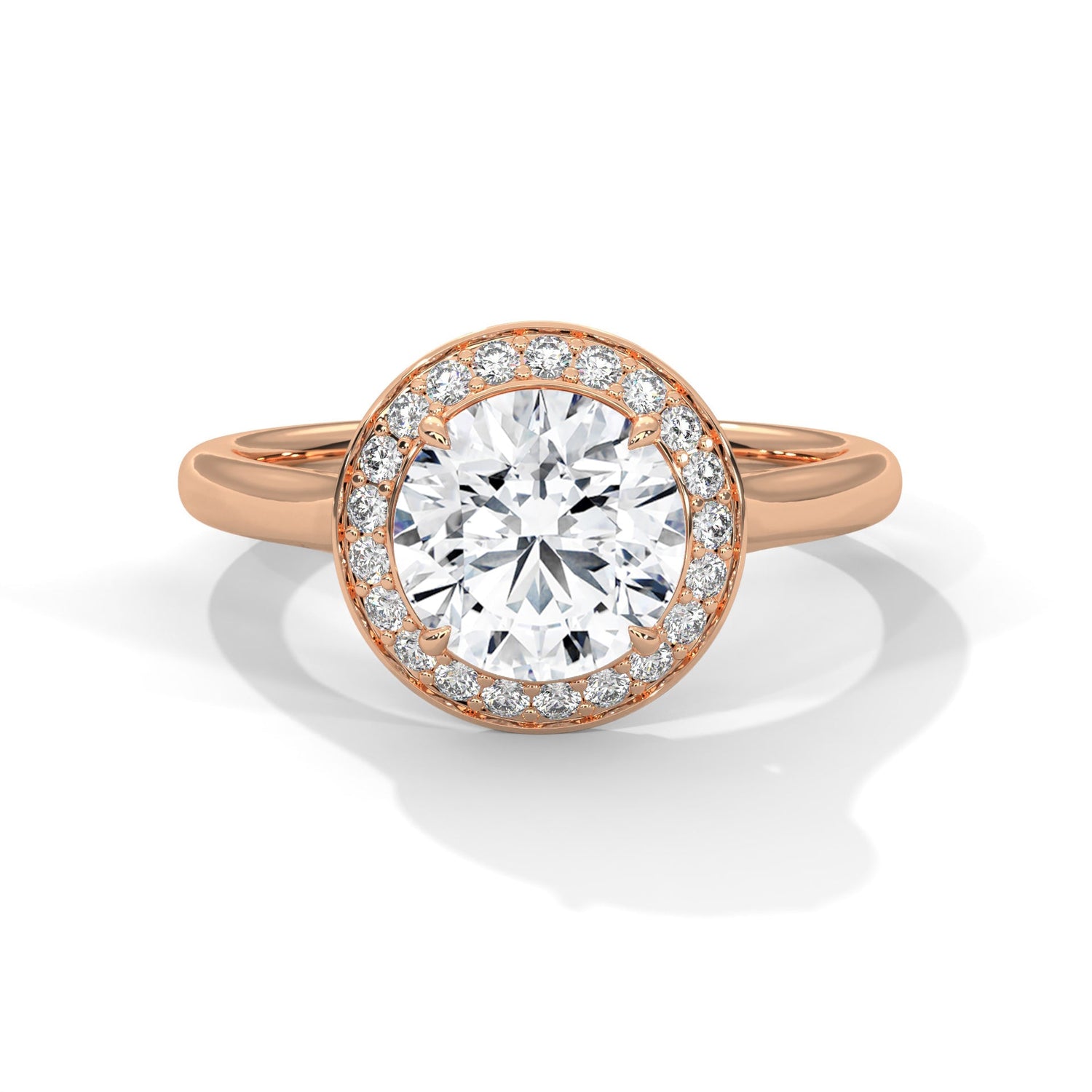 Rose gold ring with a large diamond on a white background 