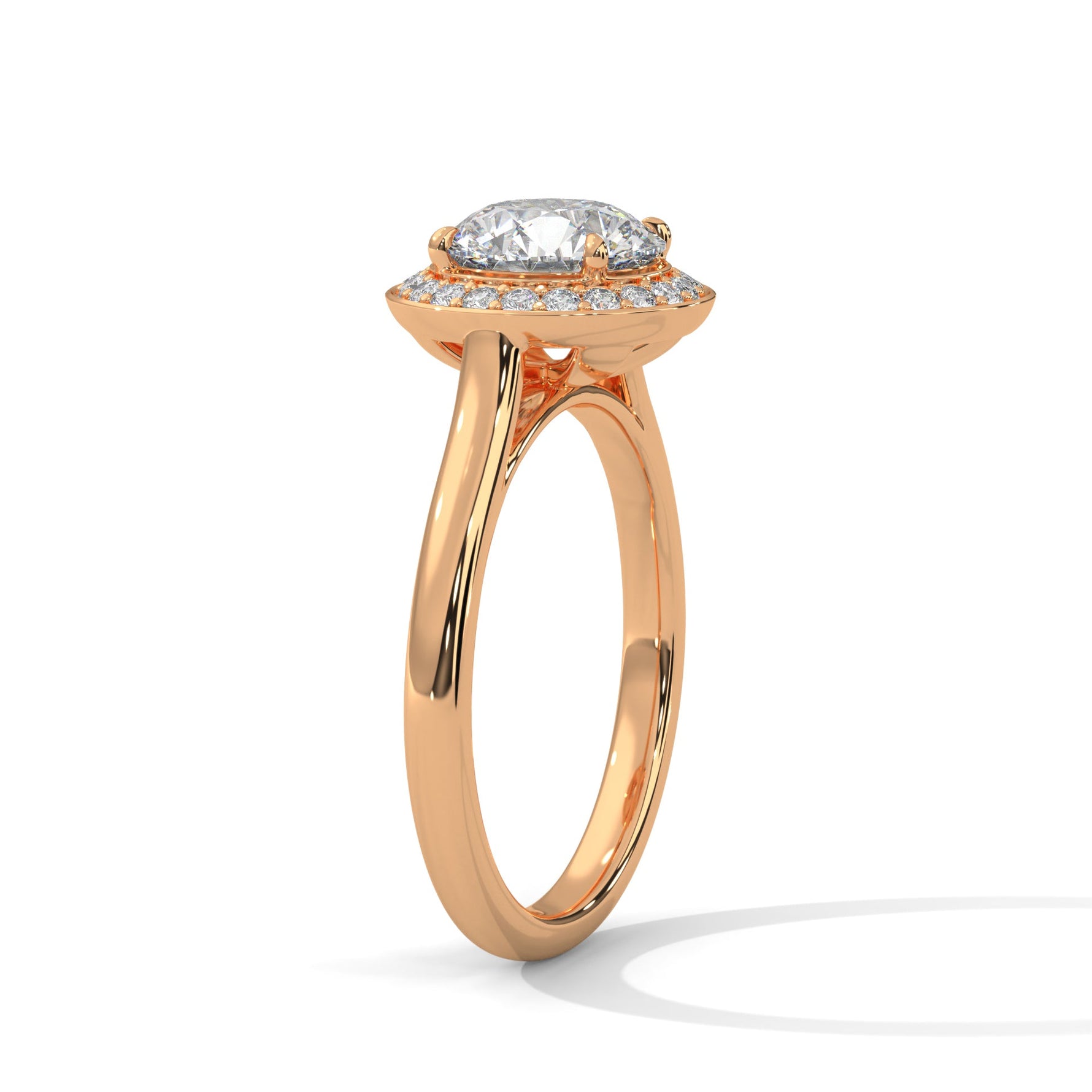 Rose gold ring with a large diamond on a white background 