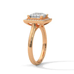 Rose gold ring with a large diamond on a white background 