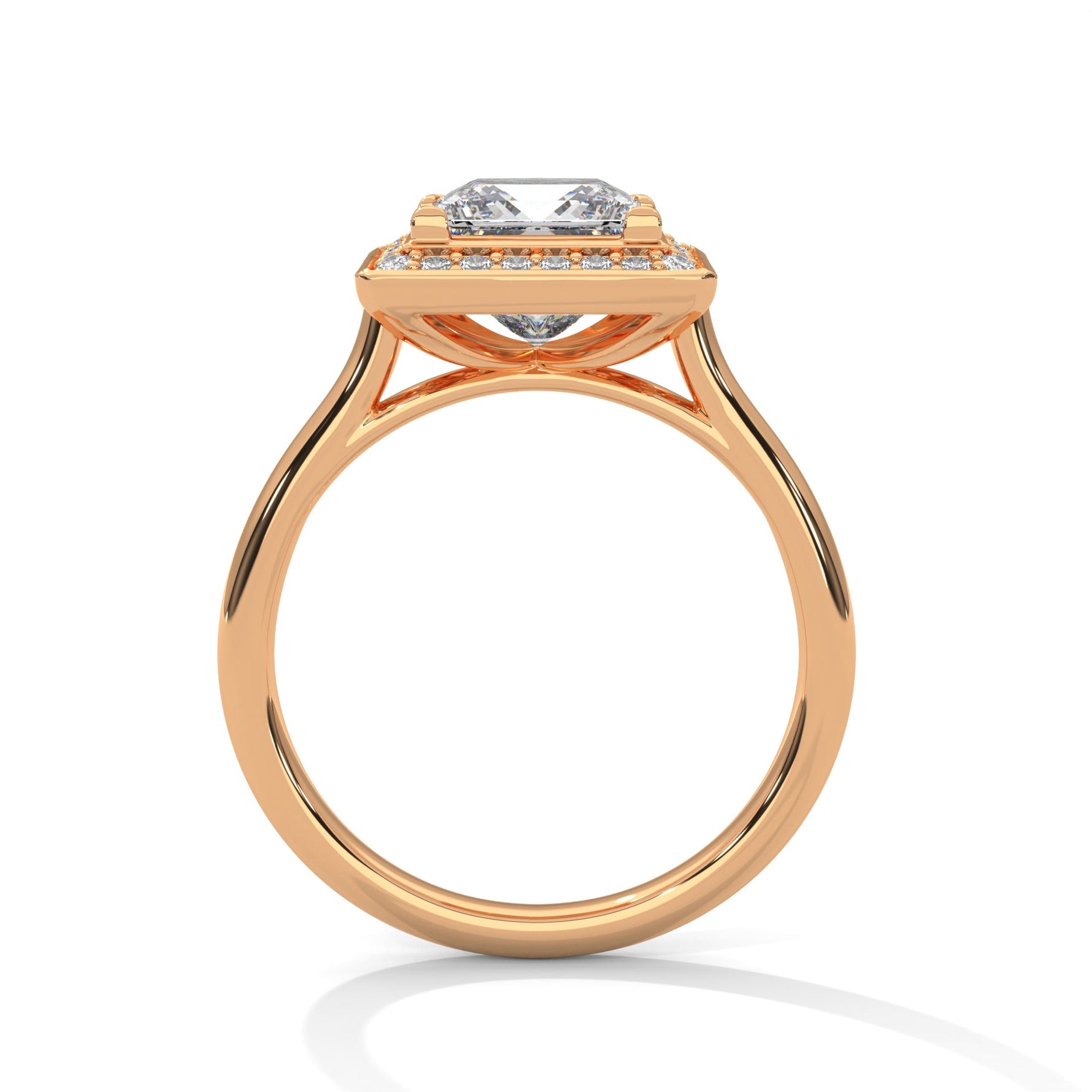 Rose gold ring with a large diamond on a white background 