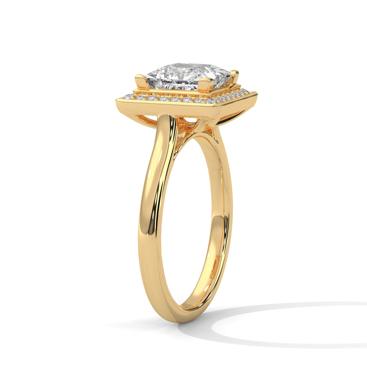 Gold ring with a large diamond on a white background 