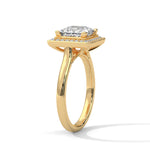 Gold ring with a large diamond on a white background 
