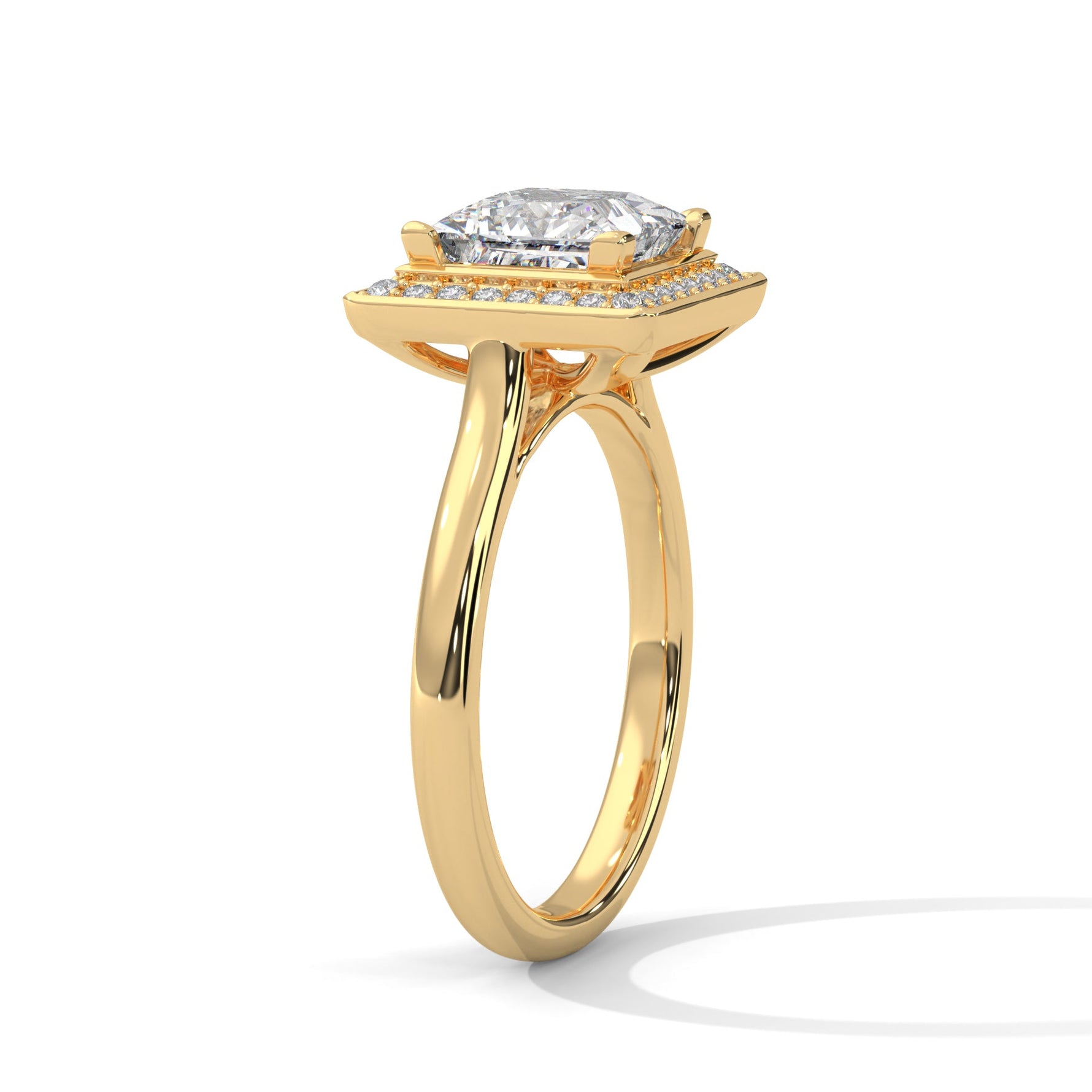 Gold ring with a large diamond on a white background 
