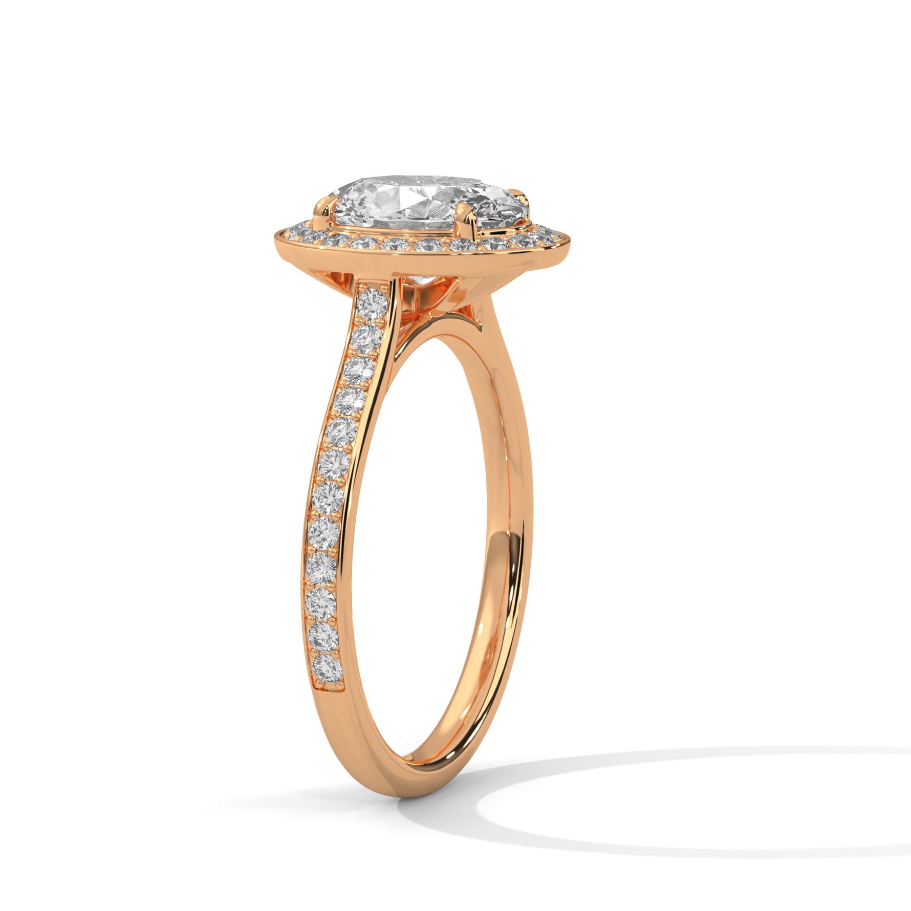 Rose gold ring with a large diamond on a white background 