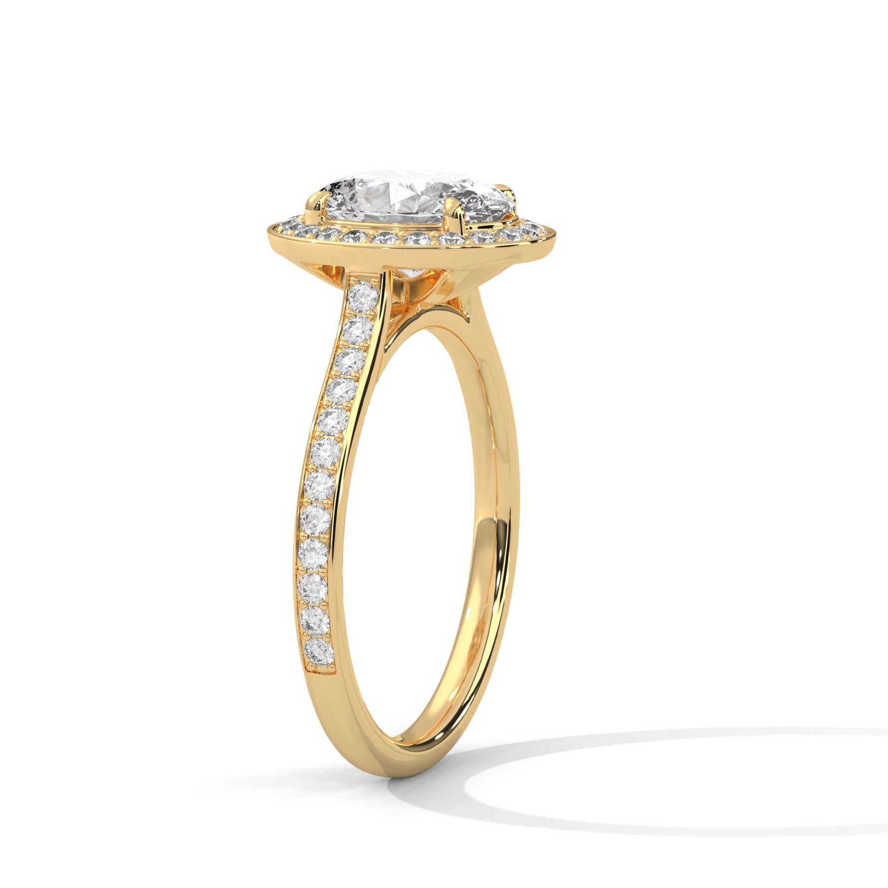 Gold ring with a large diamond on a white background 