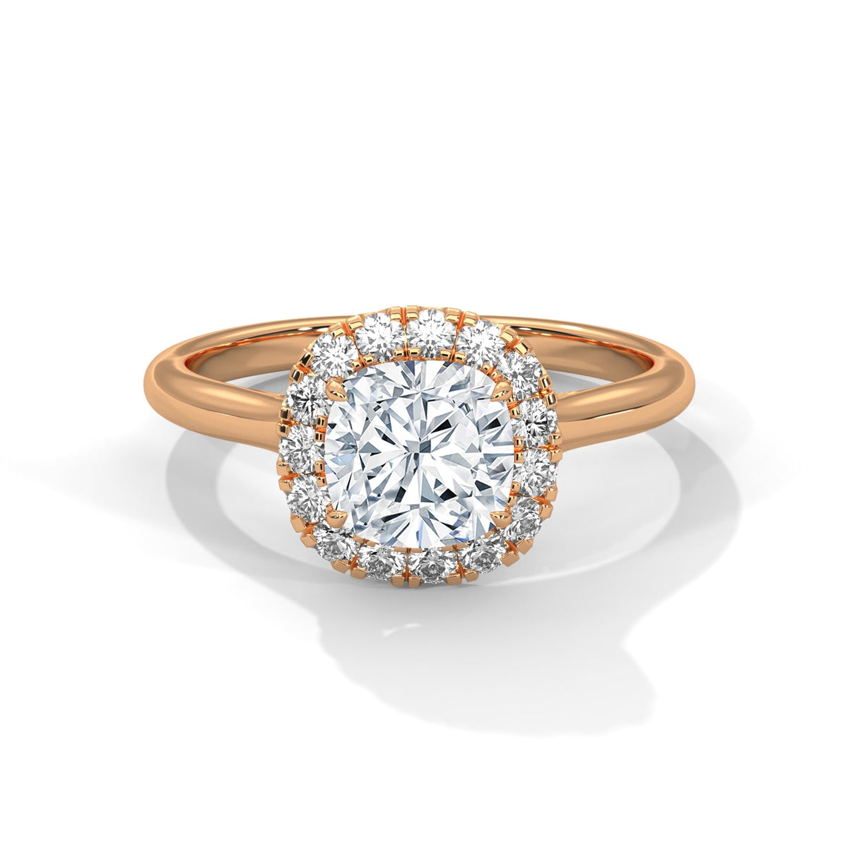 Rose gold ring with a large diamond on a white background 