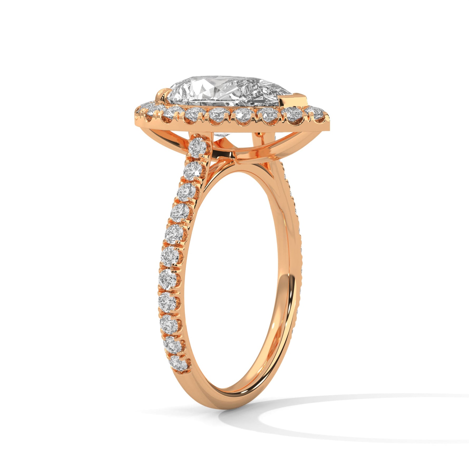 Rose gold ring with a large diamond on a white background 