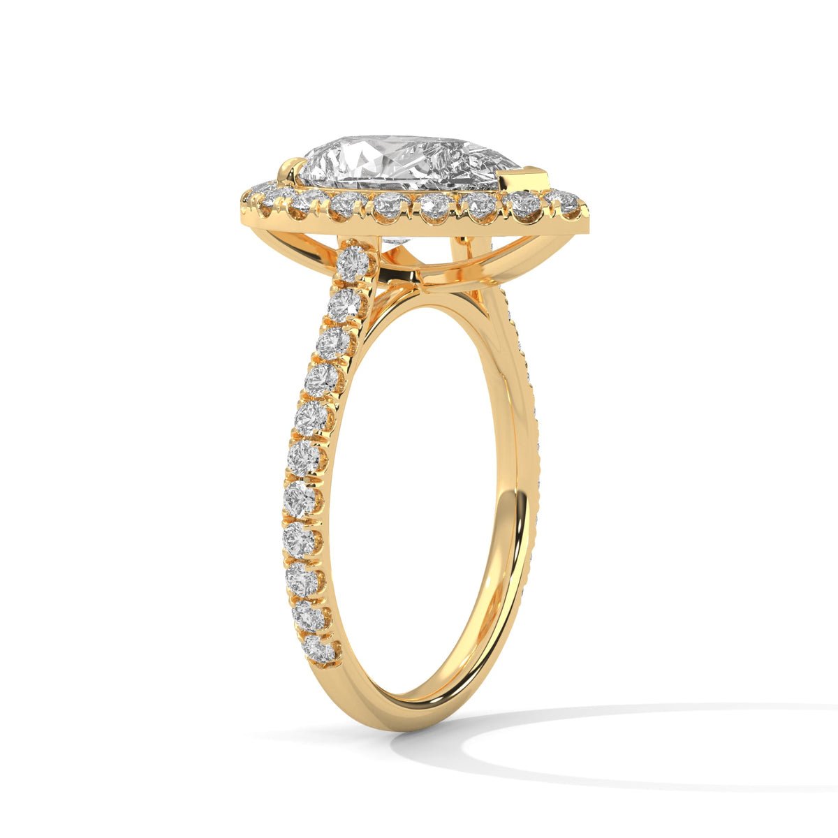 Gold ring with a large diamond on a white background 