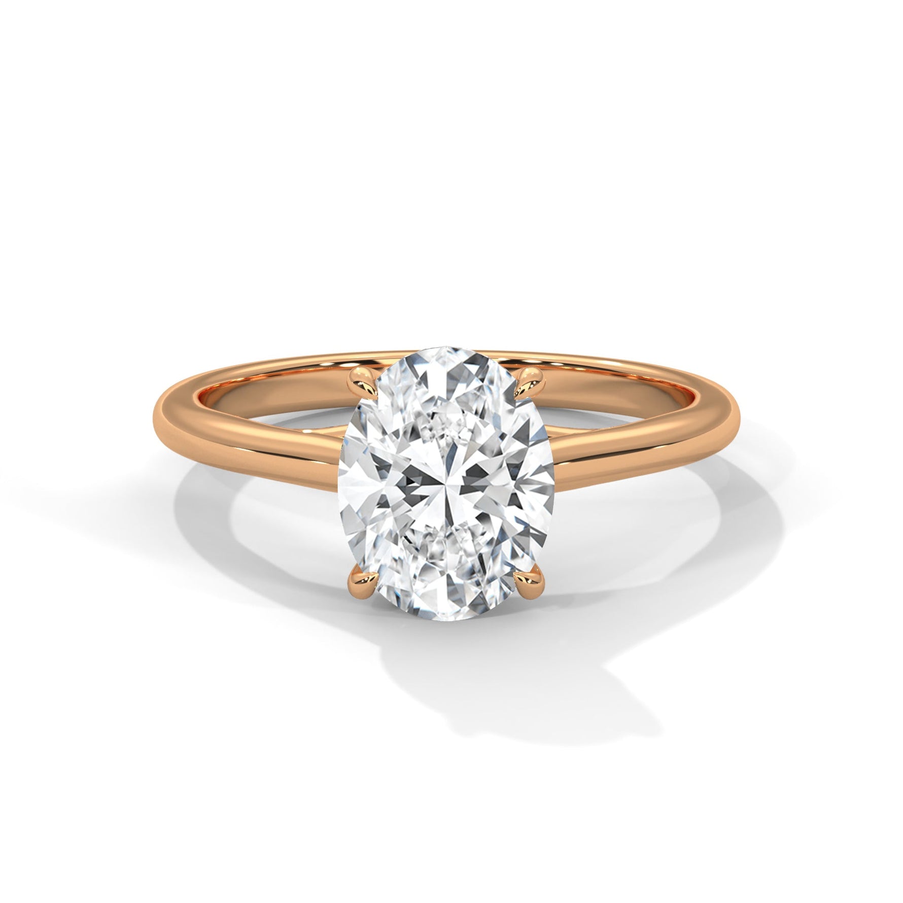 Rose gold ring with a large diamond on a white background 