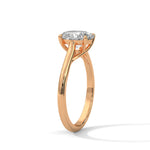 Rose gold ring with a large diamond on a white background 