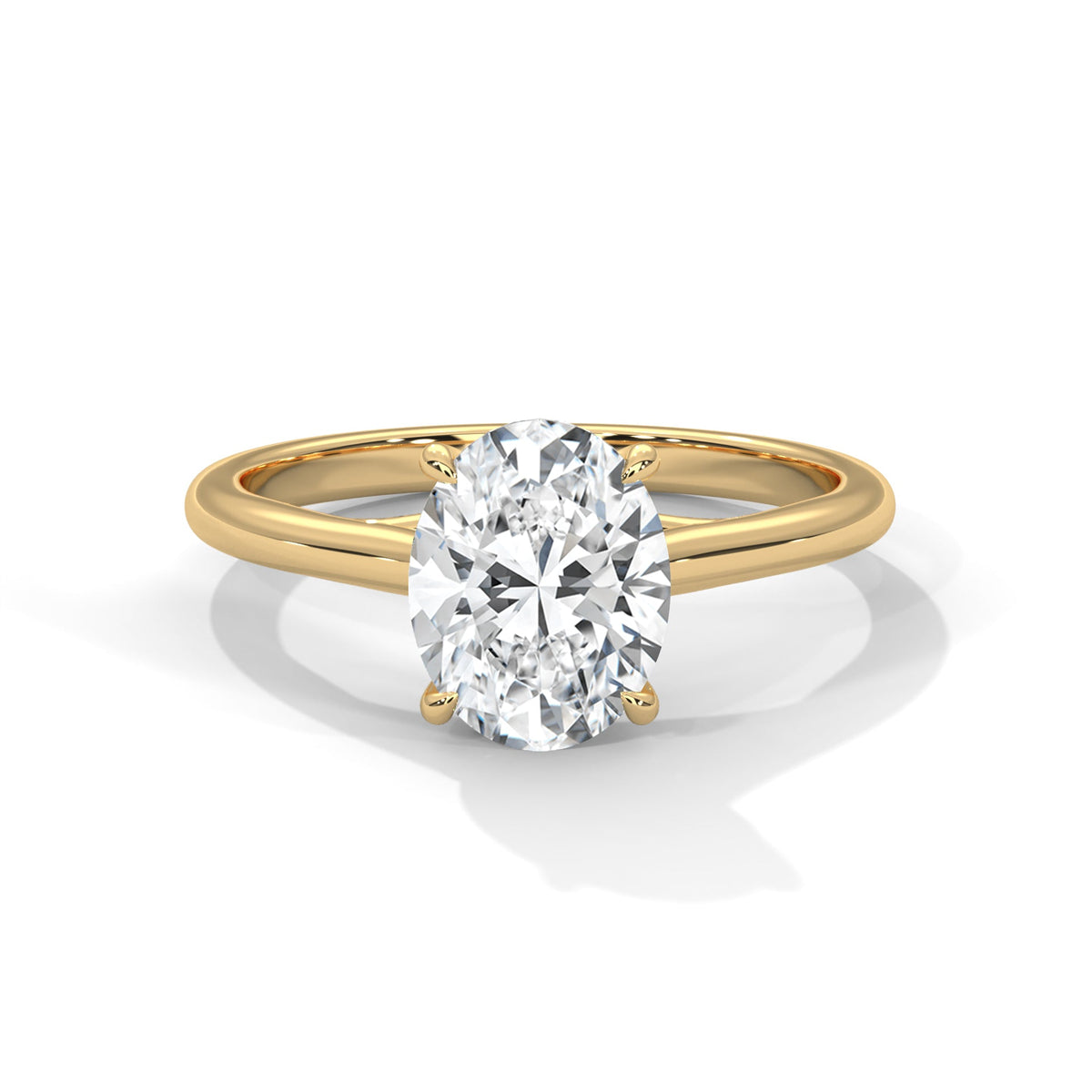Gold ring with a large diamond on a white background 