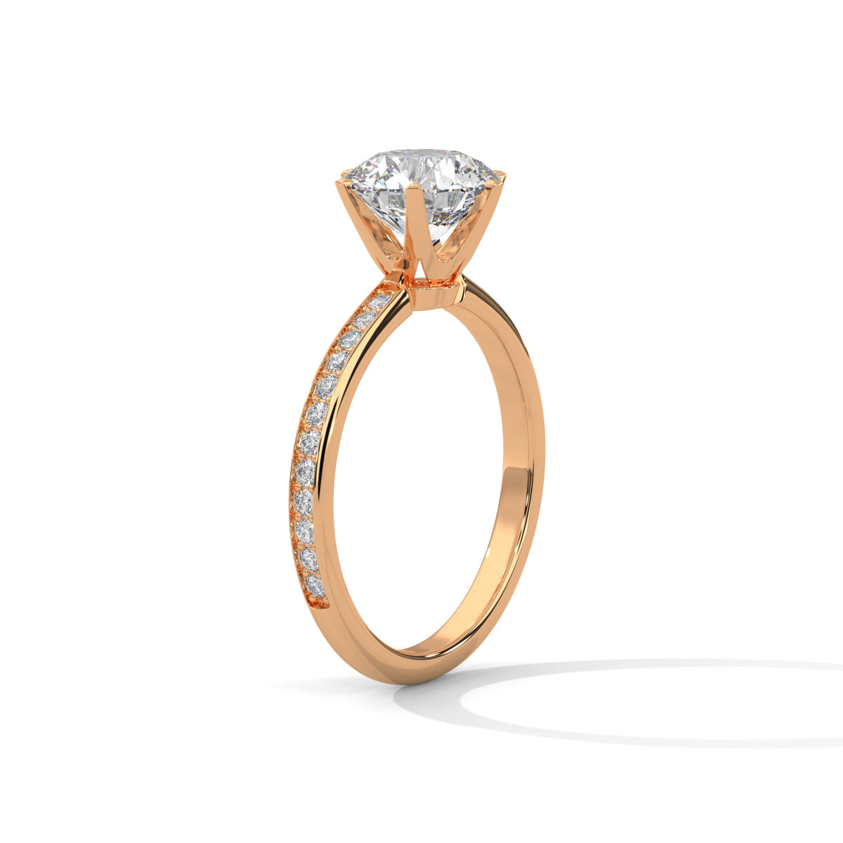 Rose gold ring with a large diamond on a white background 