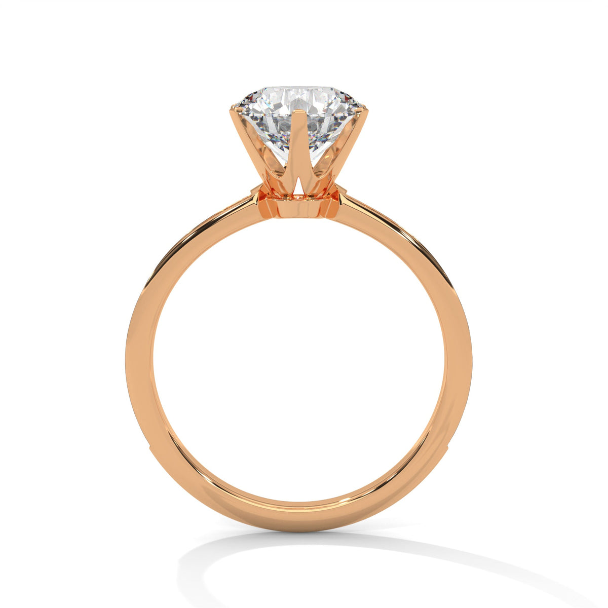 Rose gold ring with a large diamond on a white background 