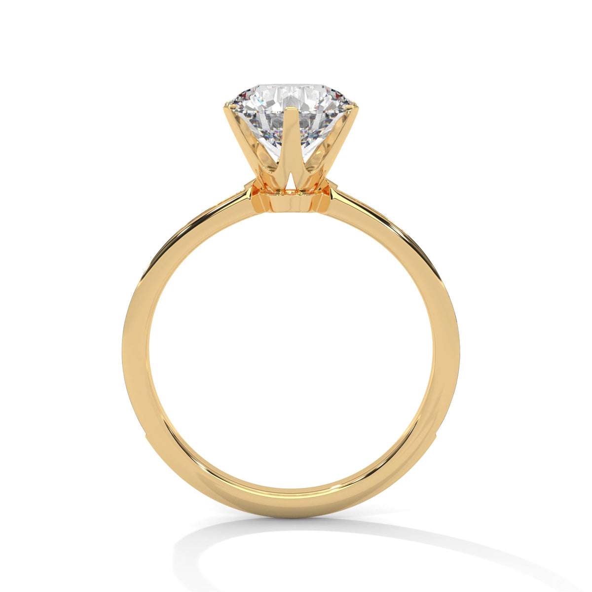 Gold ring with a large diamond on a white background 