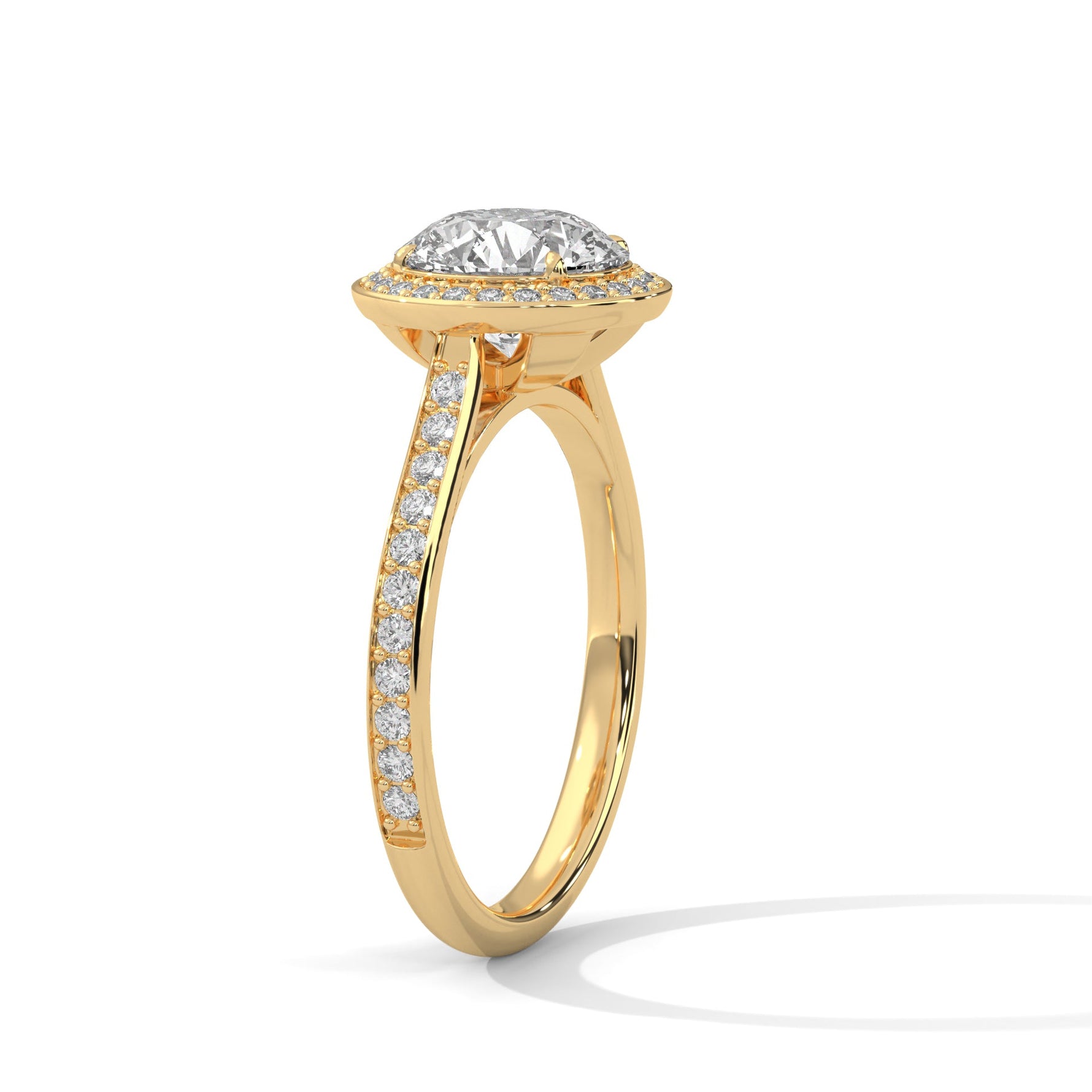 Gold ring with a large diamond on a white background 
