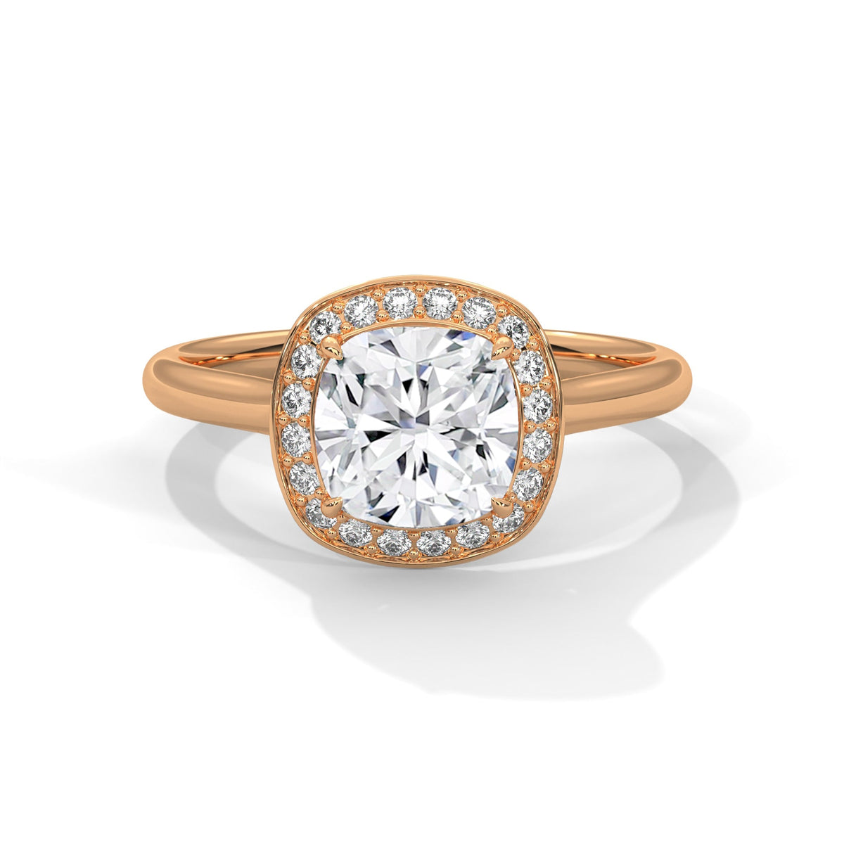 Rose gold ring with a large diamond on a white background 