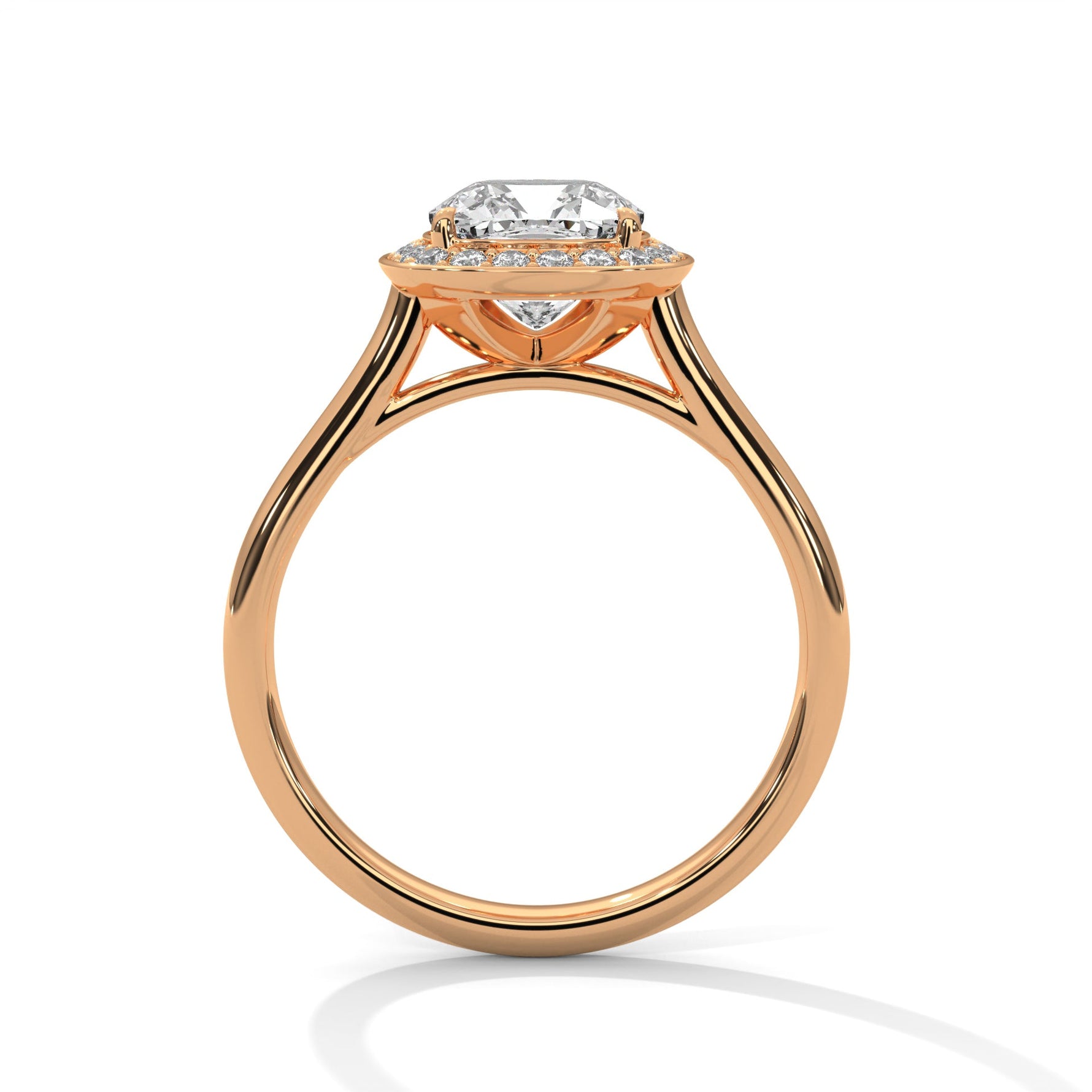 Rose gold ring with a large diamond on a white background 
