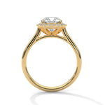 Gold ring with a large diamond on a white background 