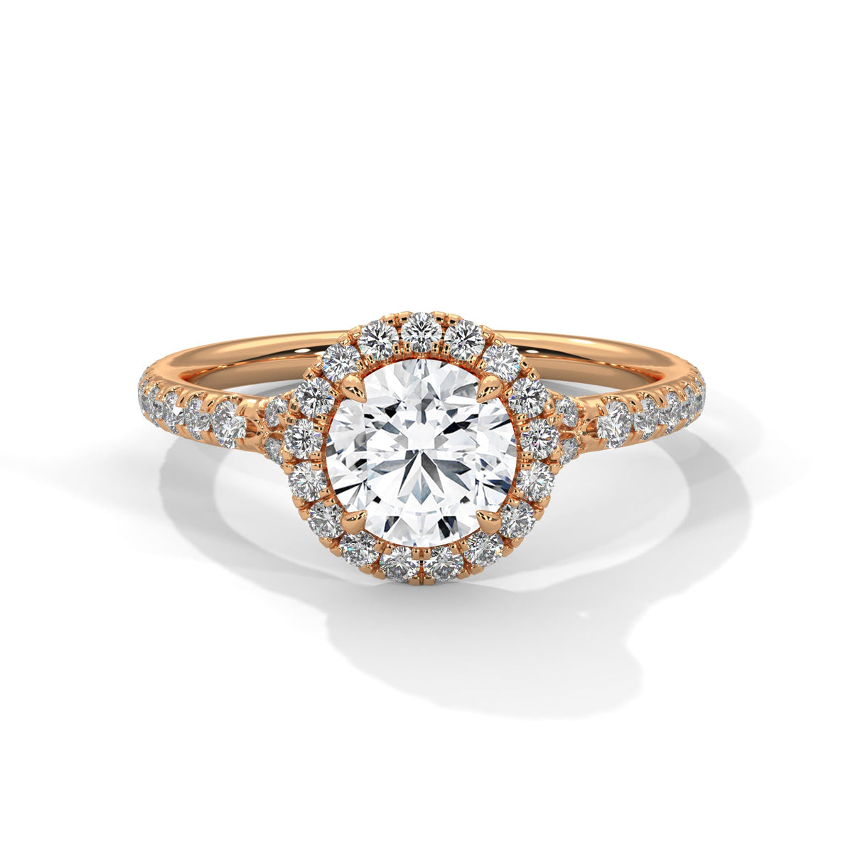 Rose gold ring with a large diamond on a white background 