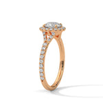 Rose gold ring with a large diamond on a white background 
