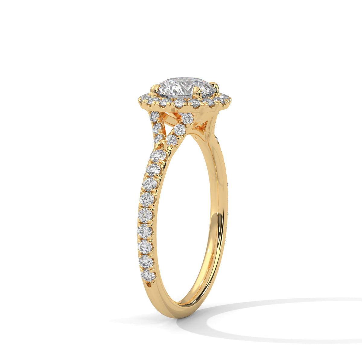 Gold ring with a large diamond on a white background 