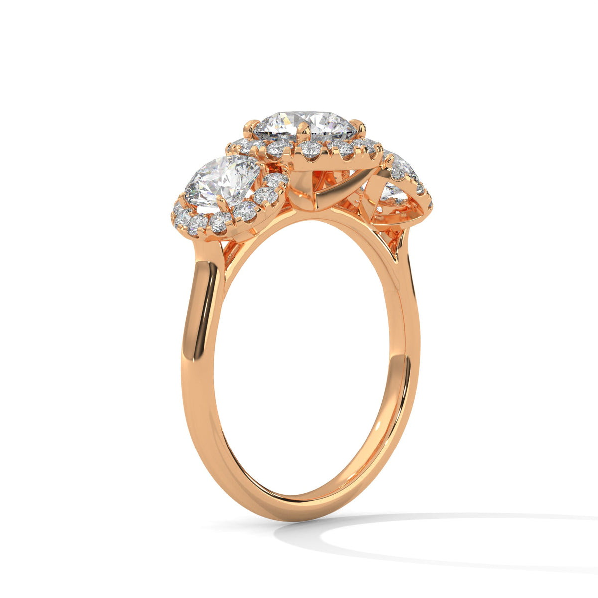 Rose gold ring with a large diamond on a white background 