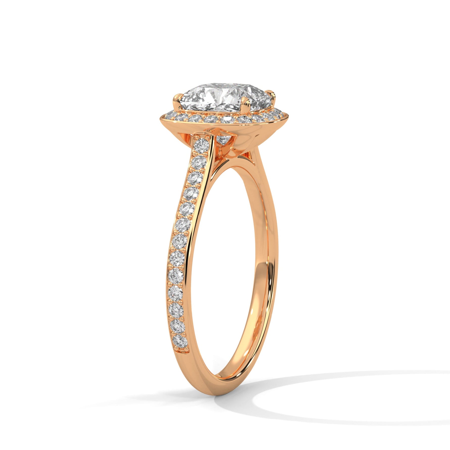 Rose gold ring with a large diamond on a white background 