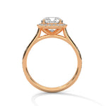 Rose gold ring with a large diamond on a white background 