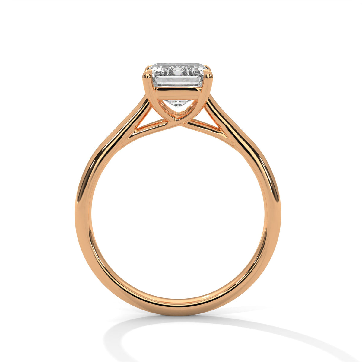 Rose gold ring with a large diamond on a white background 