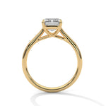 Gold ring with a large diamond on a white background 