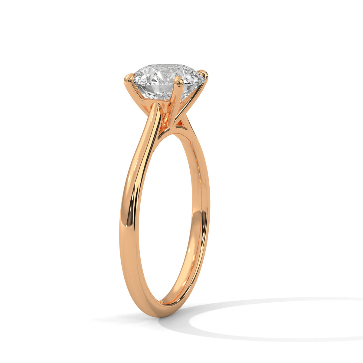 Rose gold ring with a large diamond on a white background 