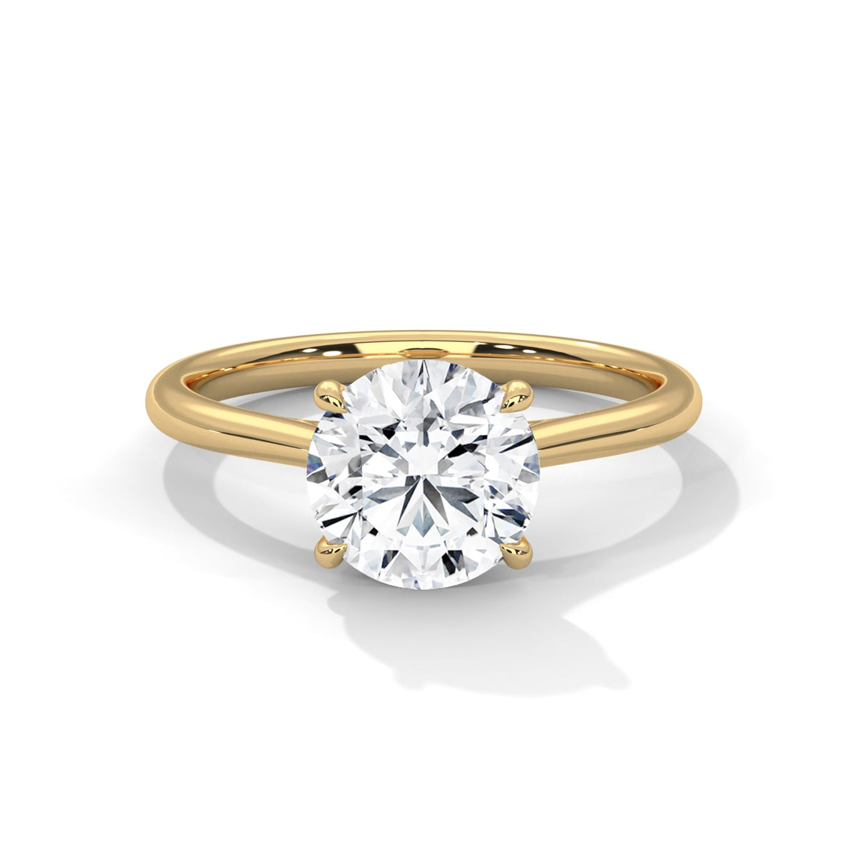 Gold ring with a large diamond on a white background 