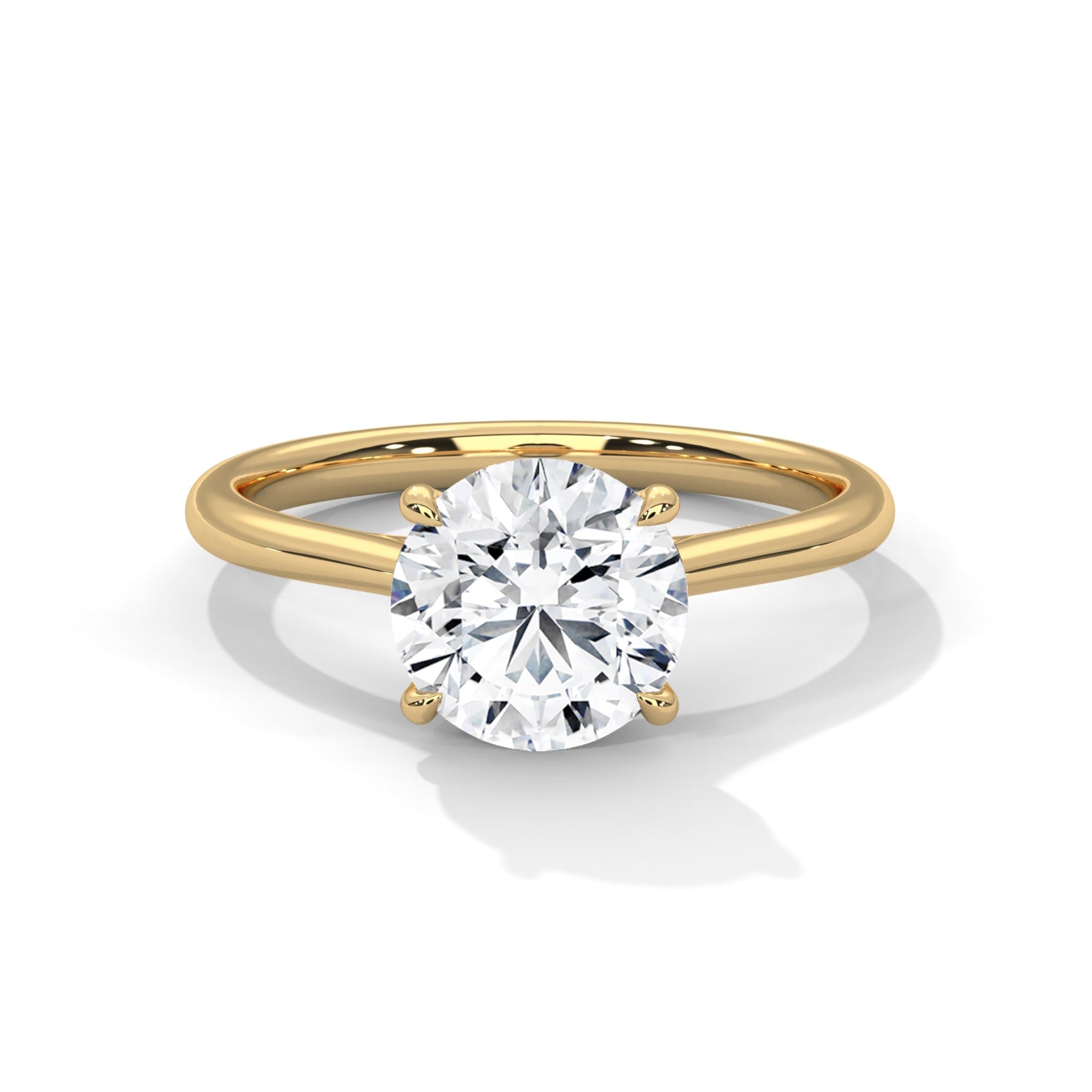 Gold ring with a large diamond on a white background 