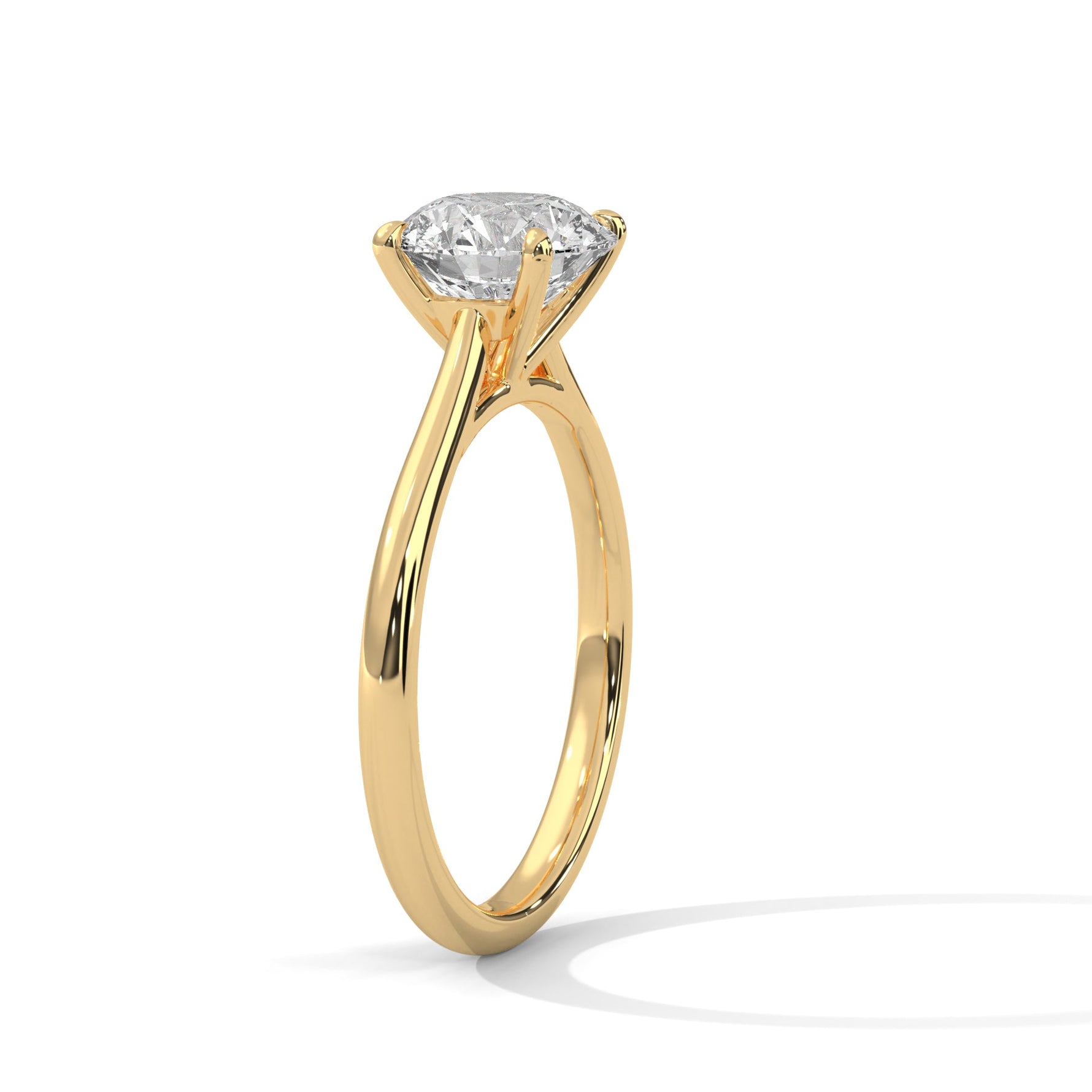 Gold ring with a large diamond on a white background 