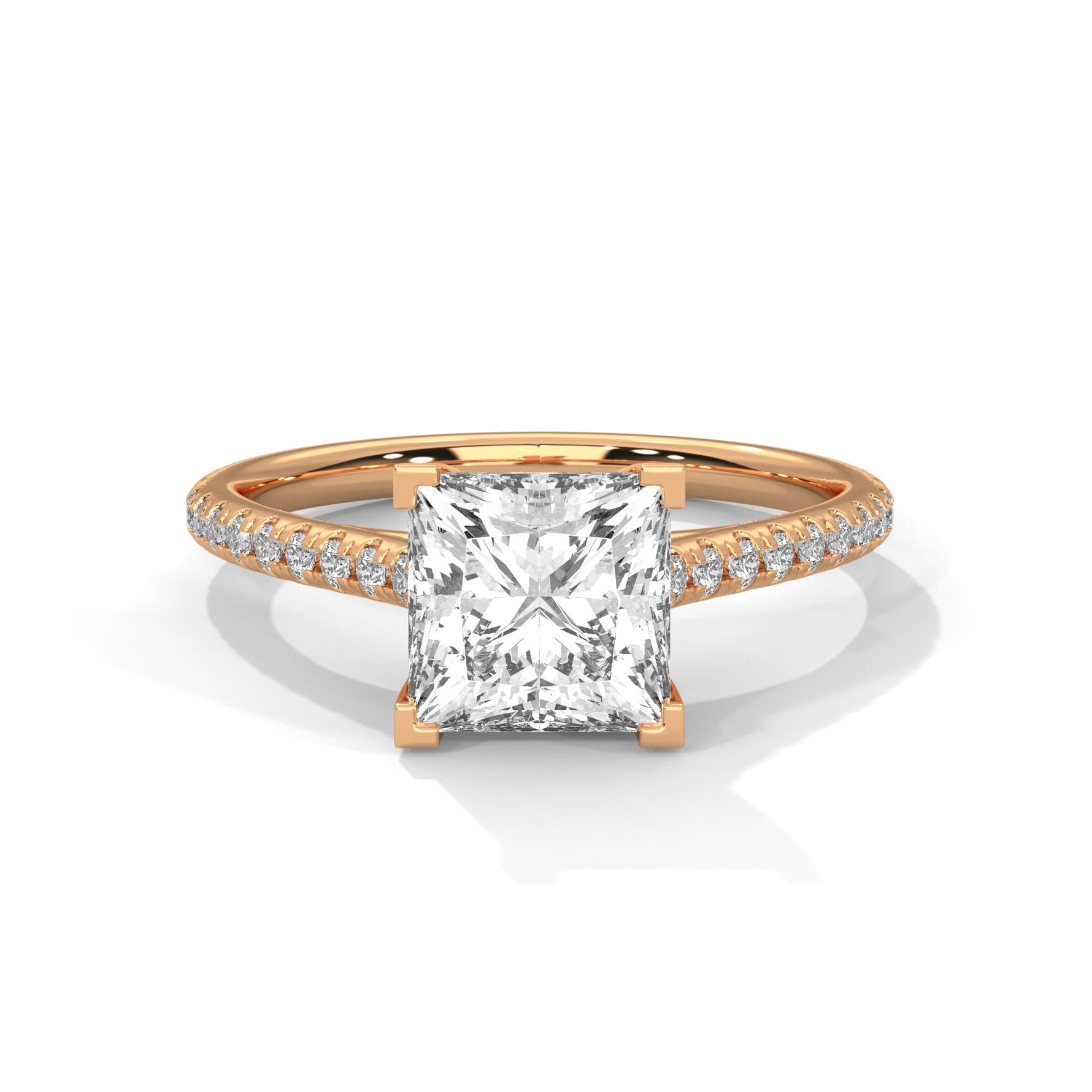 Rose gold ring with a large diamond on a white background 