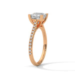 Rose gold ring with a large diamond on a white background 