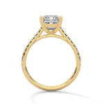 Gold ring with a large diamond on a white background 