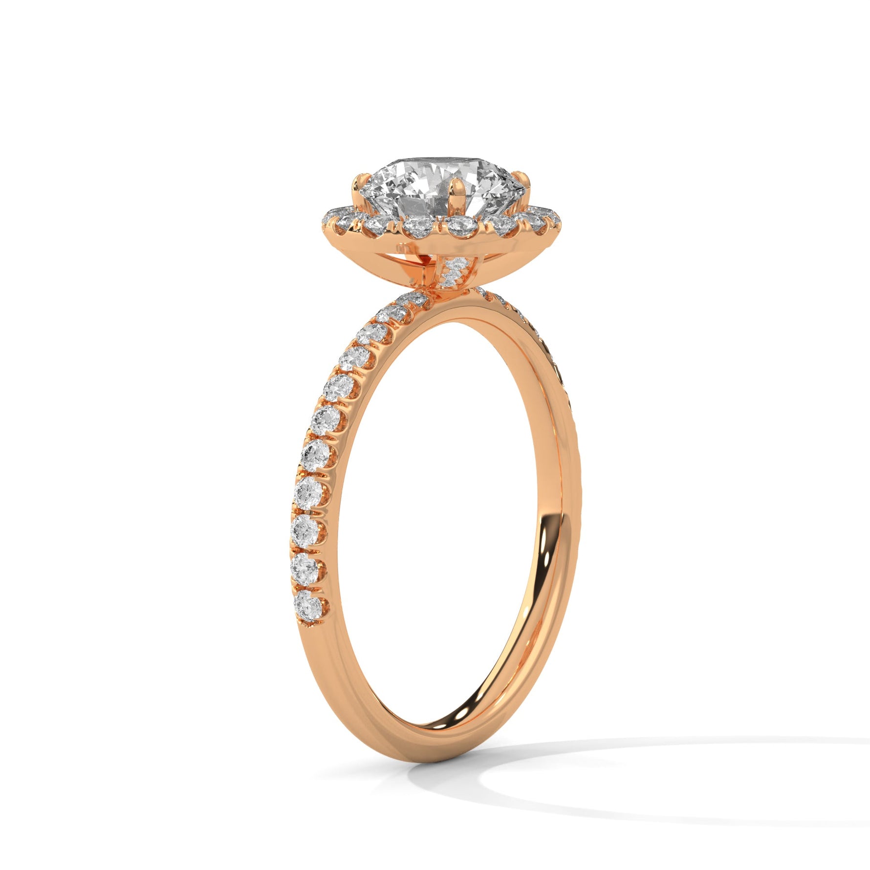 Rose gold ring with a large diamond on a white background 