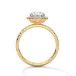 Gold ring with a large diamond on a white background 