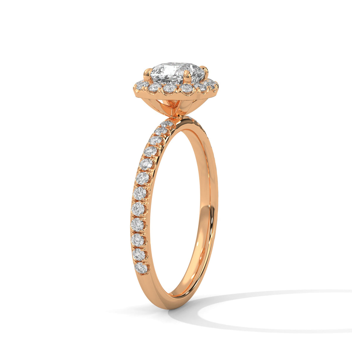 Rose gold ring with a large diamond on a white background 