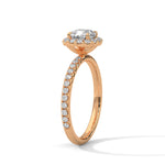Rose gold ring with a large diamond on a white background 