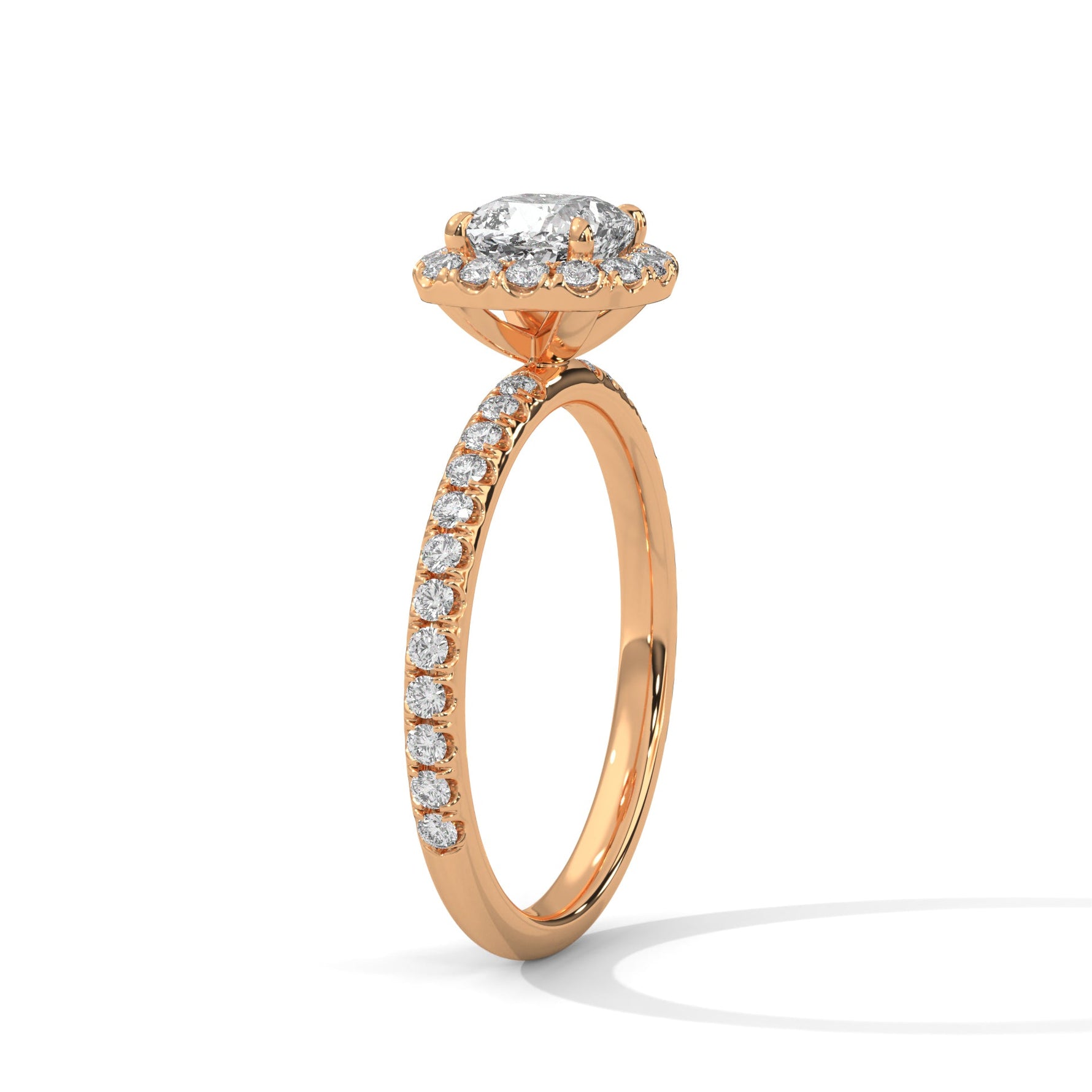 Rose gold ring with a large diamond on a white background 