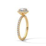 Gold ring with a large diamond on a white background 