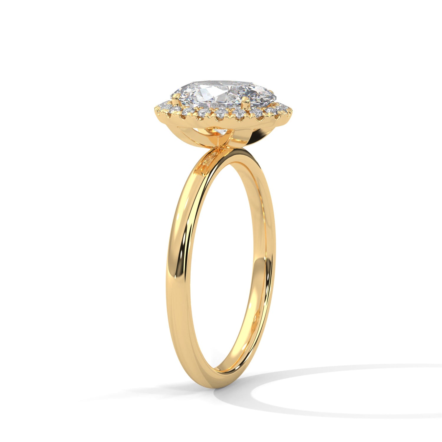 Gold ring with a large diamond on a white background 