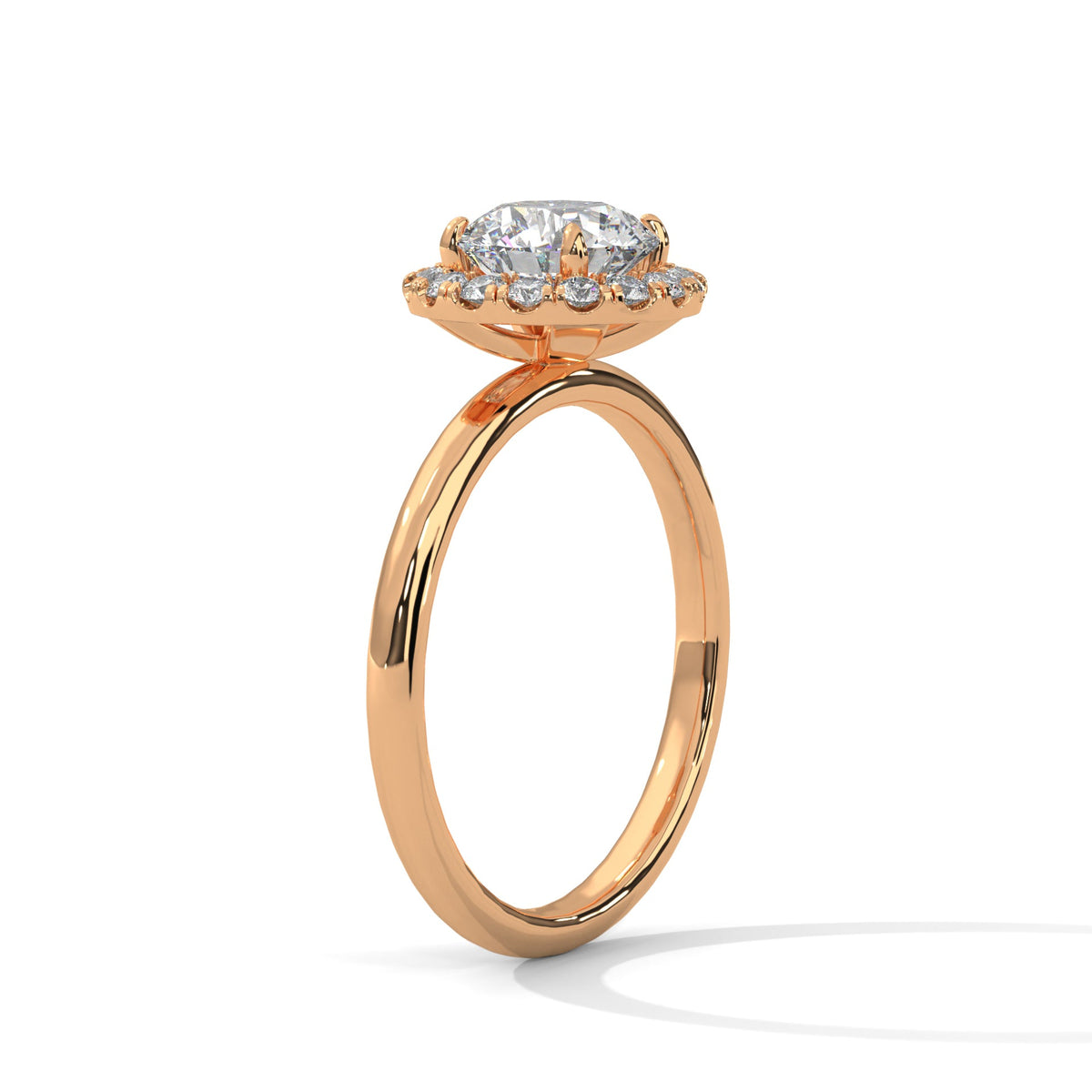 Rose gold ring with a large diamond on a white background 